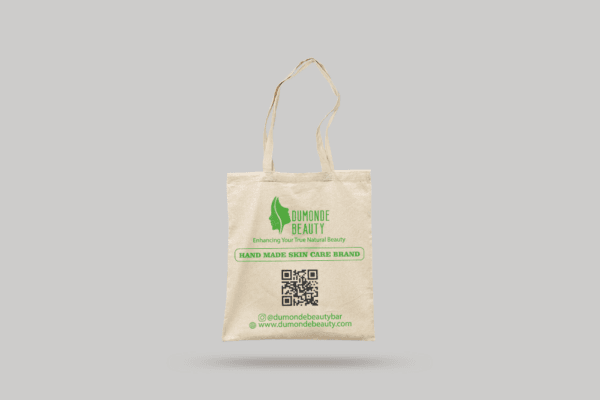 a white bag with green text and a qr code