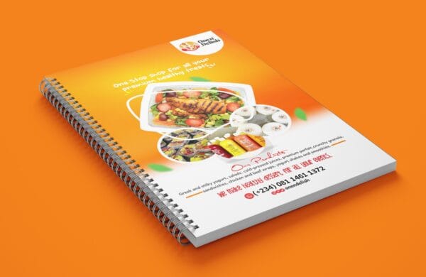 a spiral bound notebook with a picture of food on it