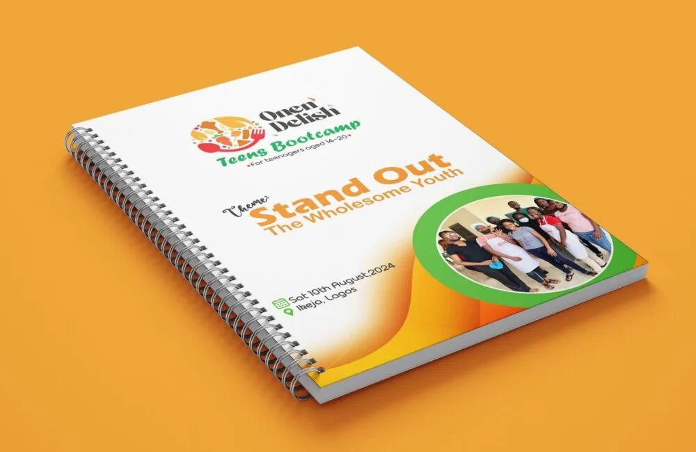 a spiral bound notebook with a group of people on it